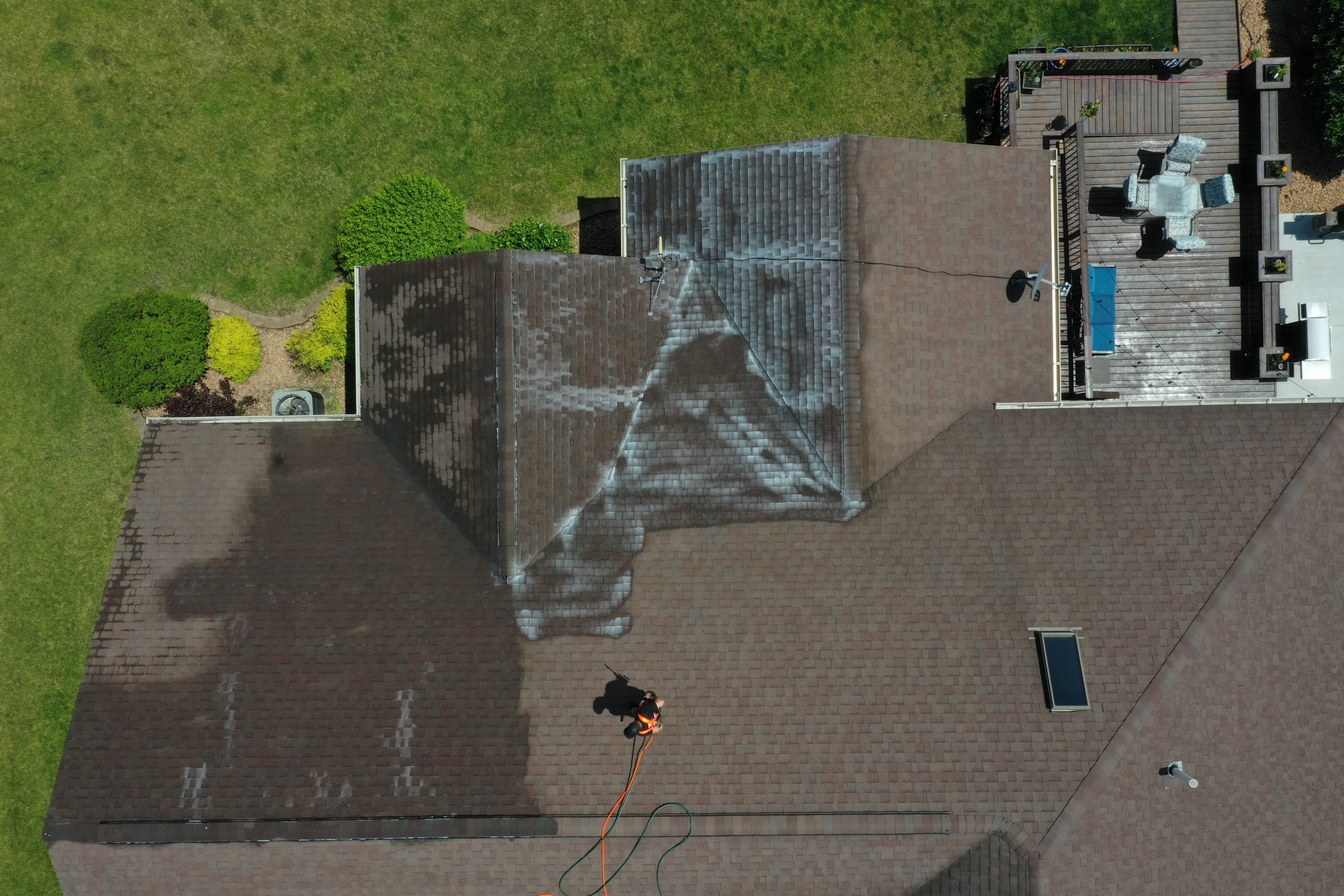 Aerial view of roof coating project in progress